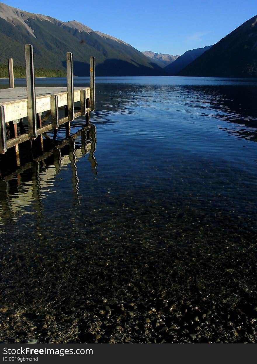 Amazin tranquil lake in New Zealand. Located at the south island in an area called Nelson Lakes. Represents peace, holidays and relax. Amazin tranquil lake in New Zealand. Located at the south island in an area called Nelson Lakes. Represents peace, holidays and relax.