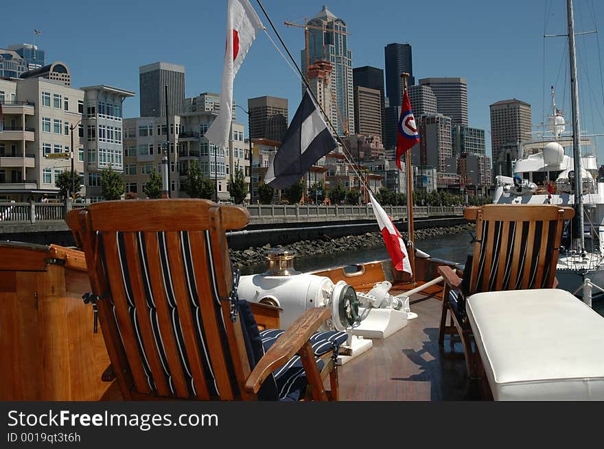 This is a picture from the deck of a classic yacht in Seattle, WA with the Seattle skyline ine the background. This is a picture from the deck of a classic yacht in Seattle, WA with the Seattle skyline ine the background.