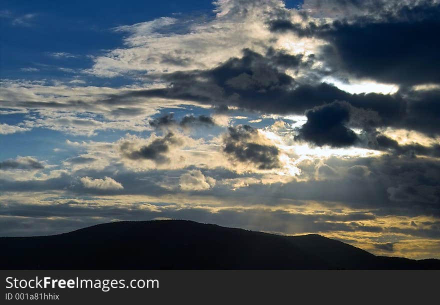 Clouds over the montains. Clouds over the montains