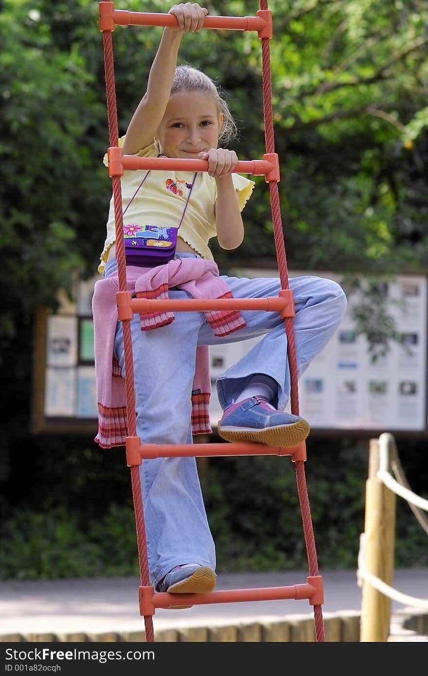 Girl on the red ladder. Girl on the red ladder