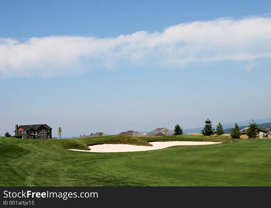 An Incrdible view of a golf course , sandtrap and neighboring home. An Incrdible view of a golf course , sandtrap and neighboring home.