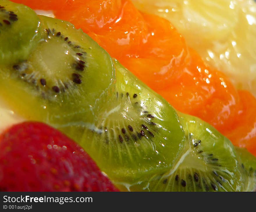 Closeup of of fruit topping on fruitcake. Closeup of of fruit topping on fruitcake