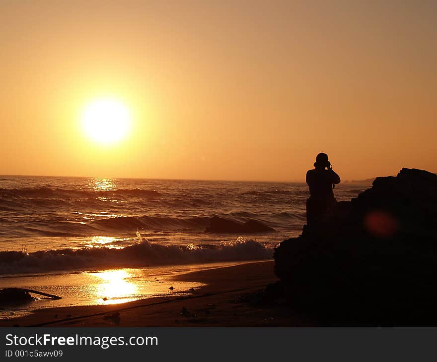 Photographer At The Beach