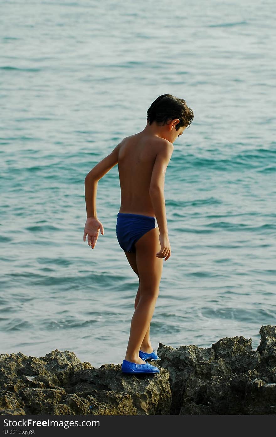 Young boy on sicilian rocks. Young boy on sicilian rocks