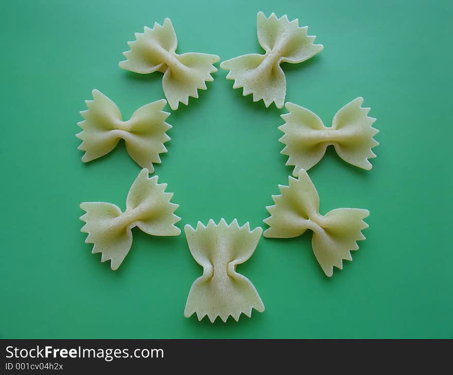 A flower made of pasta pieces. A flower made of pasta pieces