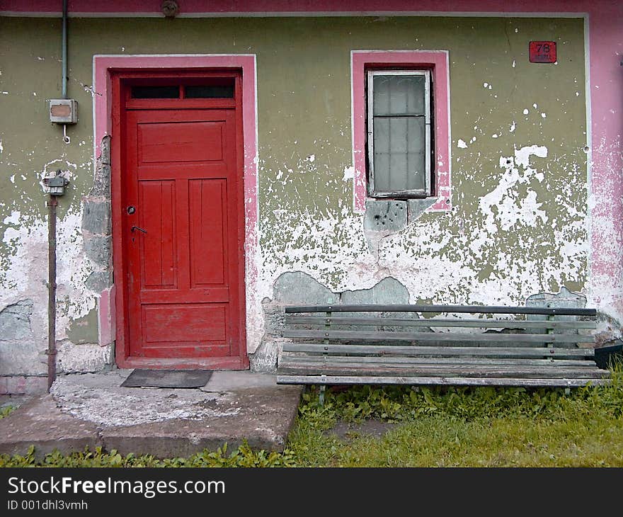 Old cottage with red doors. Old cottage with red doors