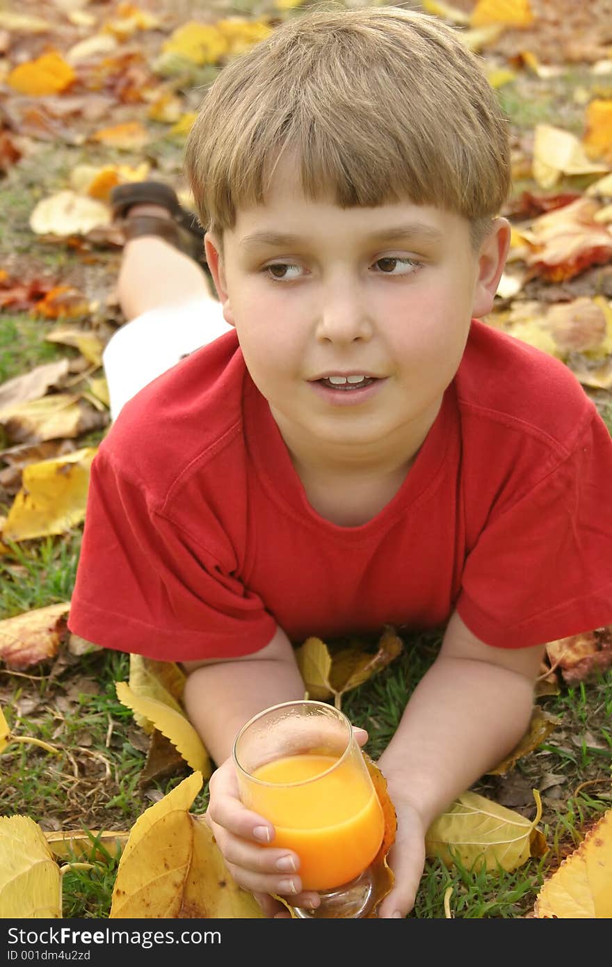 Autumn leaf fall and a boy with orange juice Browse more of my Kids Pics. Autumn leaf fall and a boy with orange juice Browse more of my Kids Pics