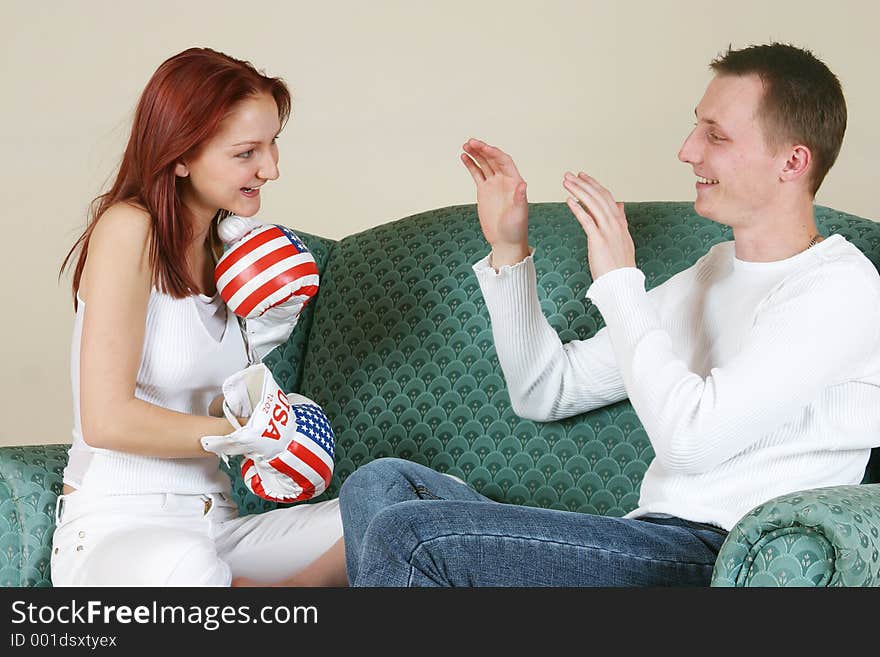 Young girl playfully boxing her friend. Young girl playfully boxing her friend