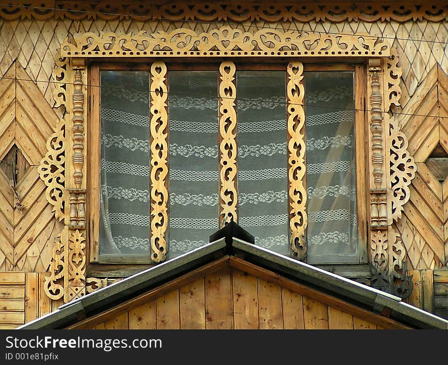 Window decoration. Wooden architecture, detail. Carpathian Mountains, Ukraine.