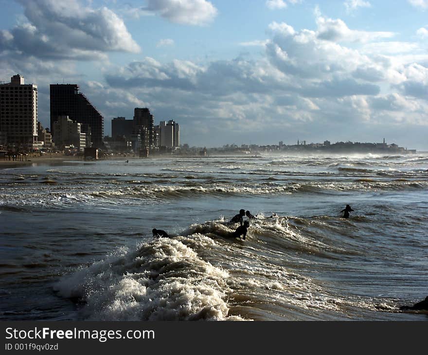 Sea with stormy sky and hotels on the shore. Sea with stormy sky and hotels on the shore