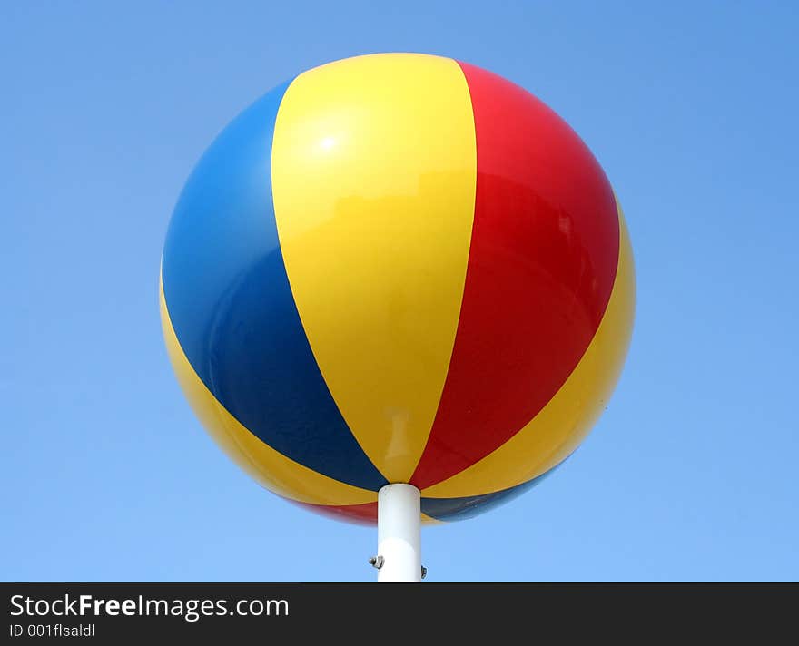 A colorful ball on a pole