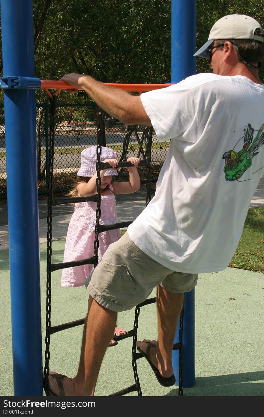 Child with dad in park. Child with dad in park