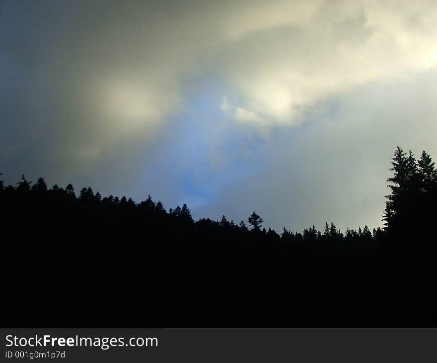 Blue Sky with grey clouds in mountains. Blue Sky with grey clouds in mountains