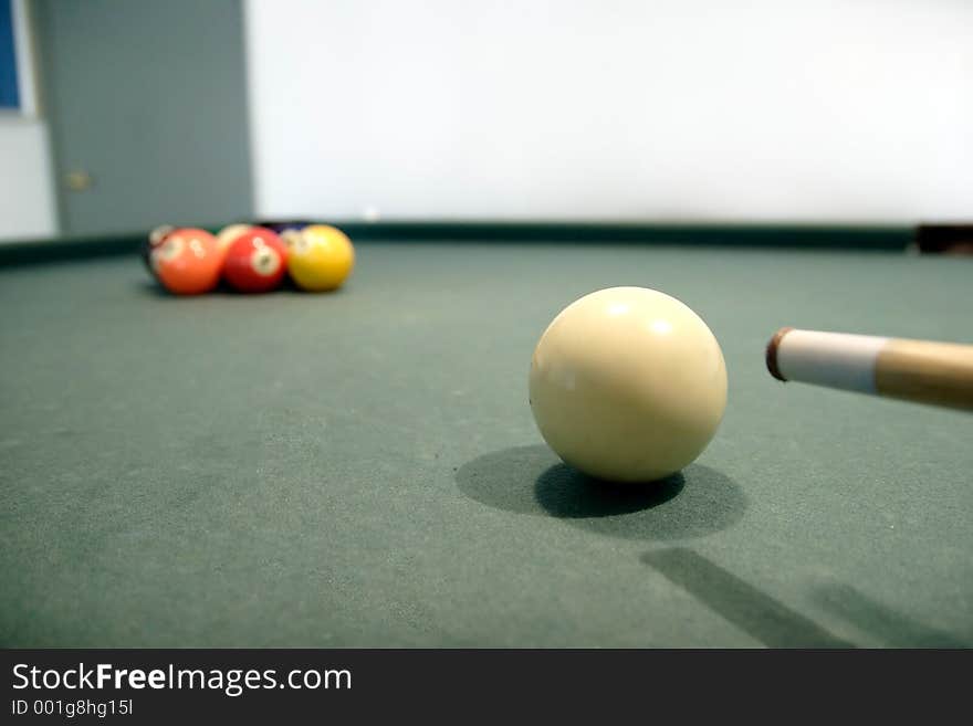 Nine ball showing cue stick and cue ball