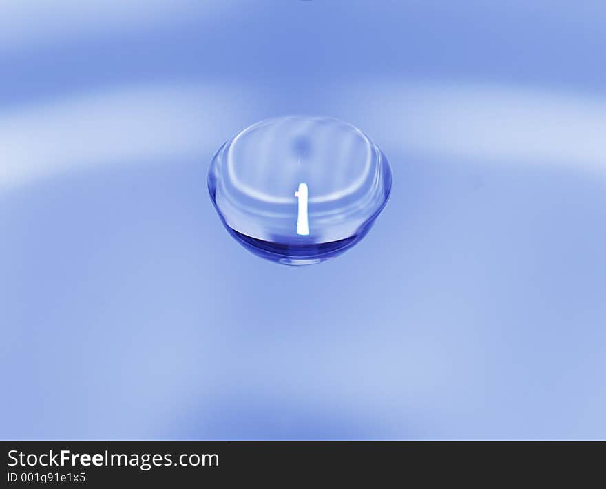 Water drop over blurred background