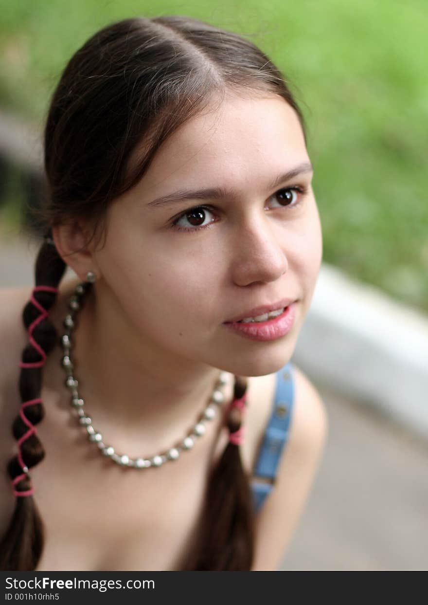 Girl with braids. Shallow DOF