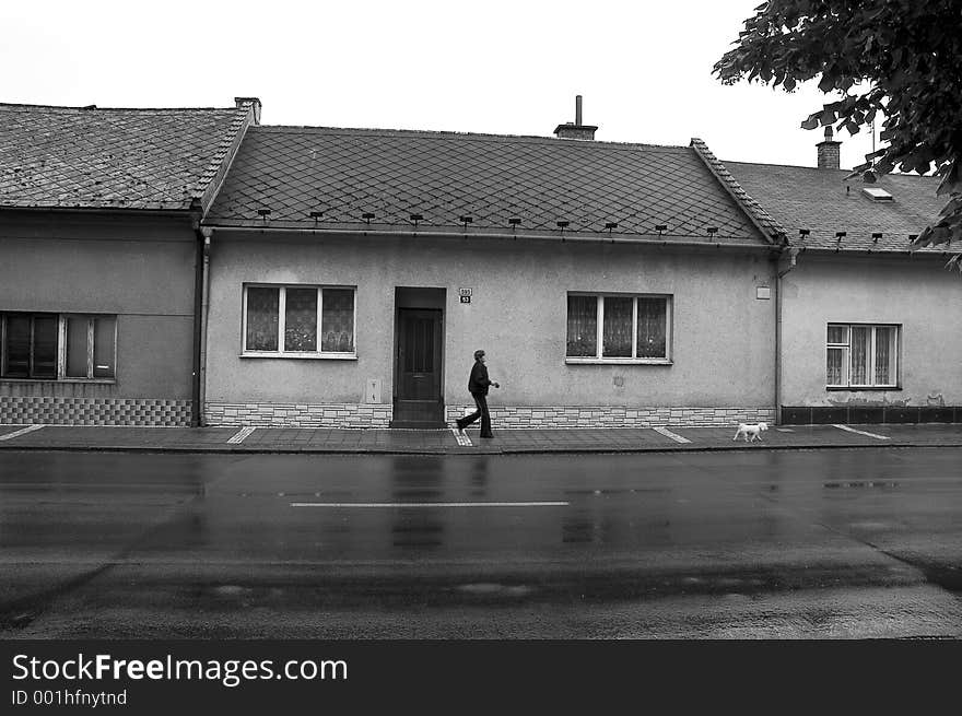 Black and white, walking past houses in czech republic. Black and white, walking past houses in czech republic