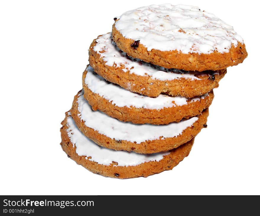 Stack of iced oatmeal cookies with raisins