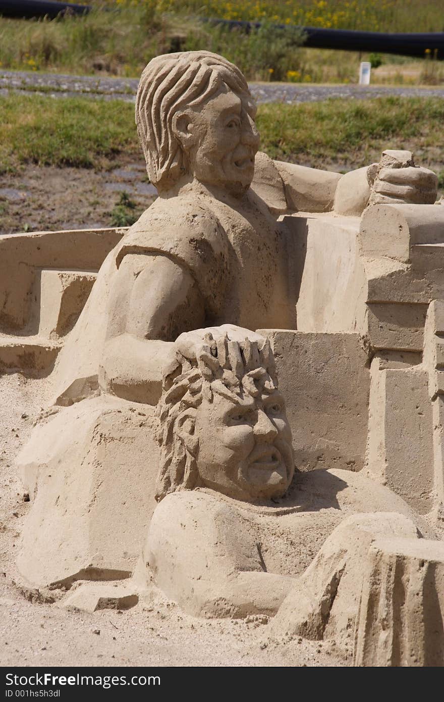 Two figures made out of sand. Two figures made out of sand