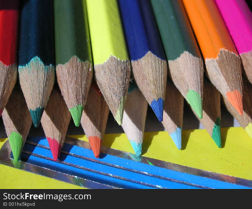 Coloured crayons left out in the sunshine. Coloured crayons left out in the sunshine