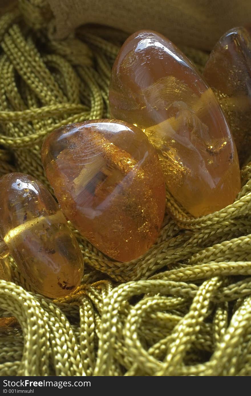 Green threads and amber