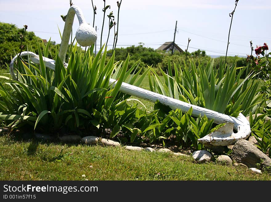 Painted White Anchor used as Lawn Ornament