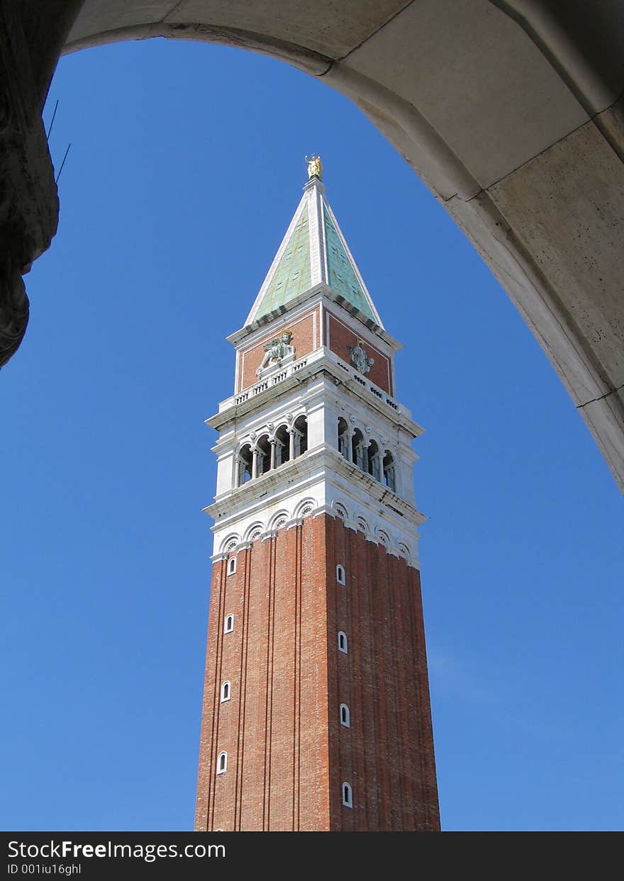 A view of the Campanile, St. Mark's Square, Venice from beneath an arch. A view of the Campanile, St. Mark's Square, Venice from beneath an arch.