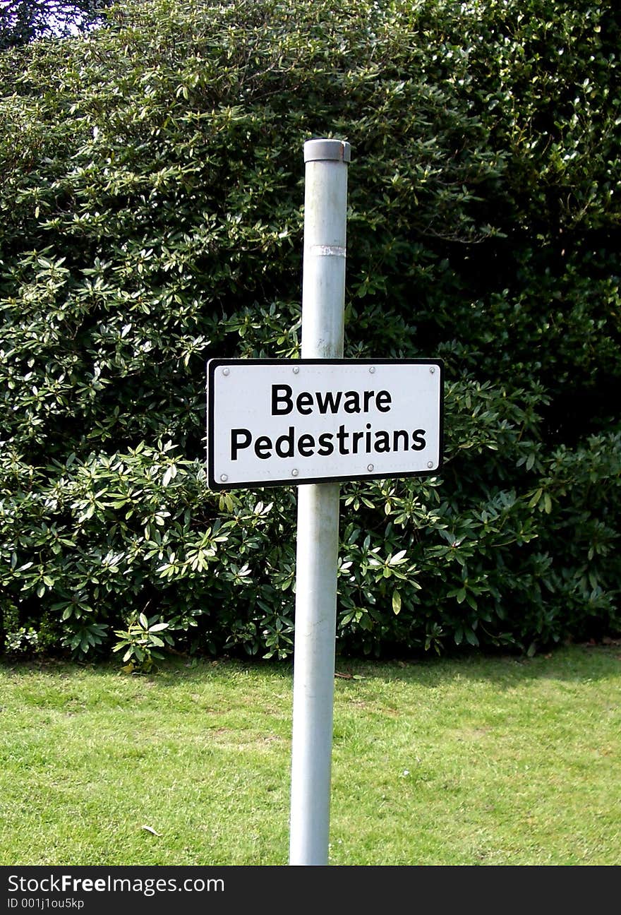 This is a sign saying beware pedestrians.