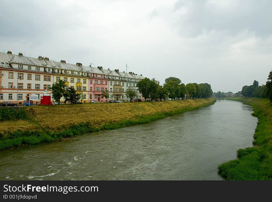 Houses by river