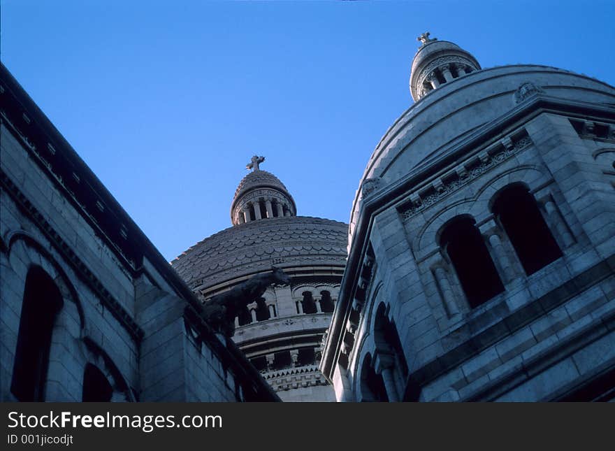 Dome of Sacre Coeur church in Montmartre. Shot at sunset on Velvia 50. Film grain visible. Dome of Sacre Coeur church in Montmartre. Shot at sunset on Velvia 50. Film grain visible.