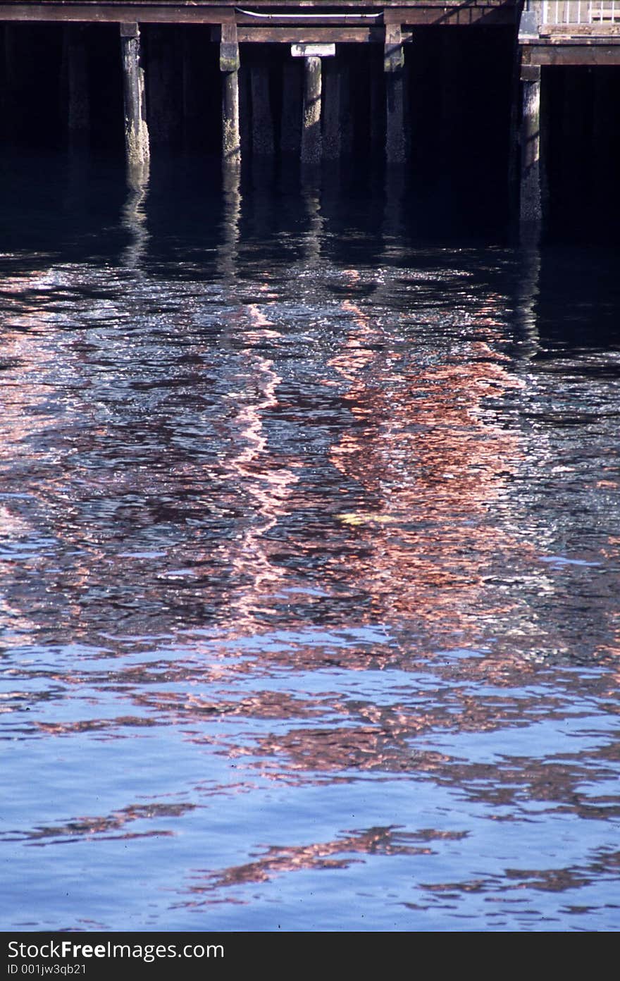 Reflections of pier structure in water. Reflections of pier structure in water