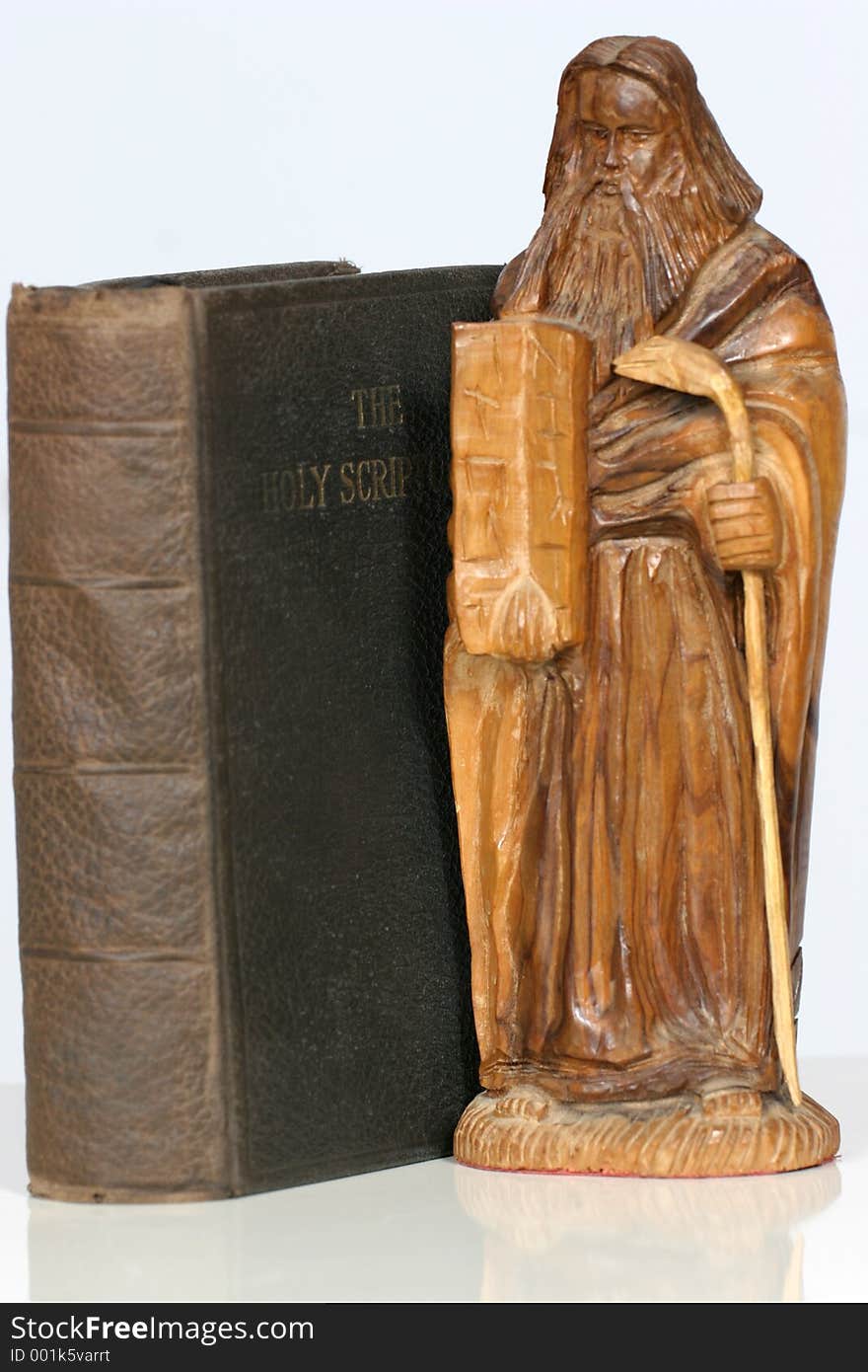 Holy Scriptures with wooden icon of Mosses and the ten commandments