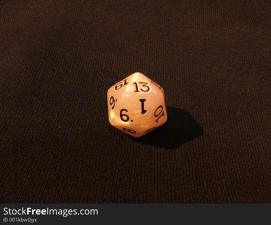 A Dice on the table. A Dice on the table