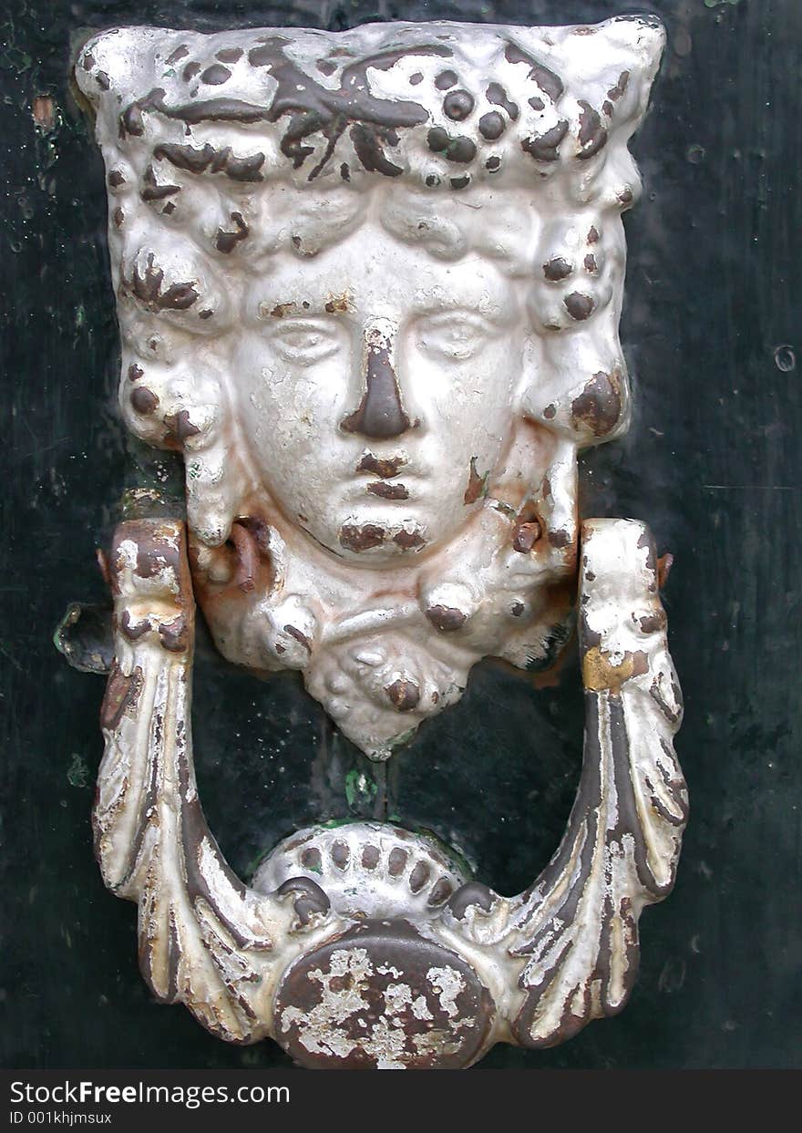 Ornate door knocker, southern Spain. Ornate door knocker, southern Spain.