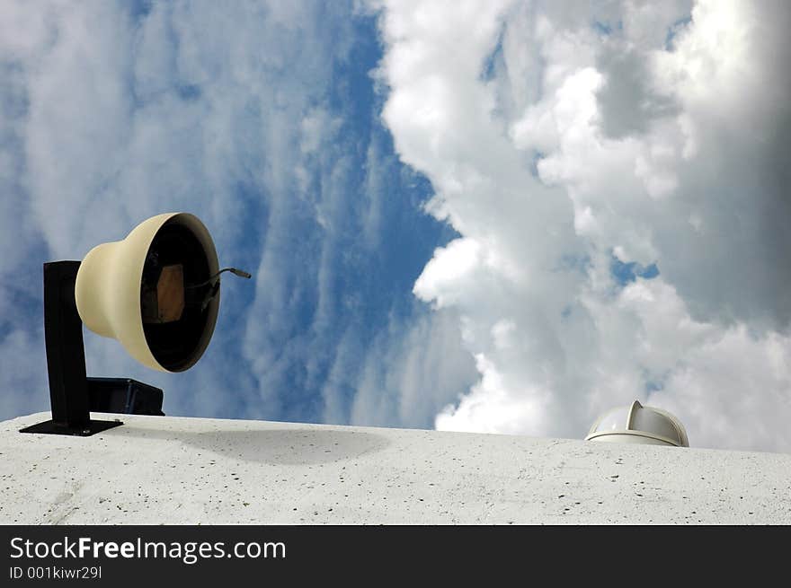 Street-light over the precipice of clouds