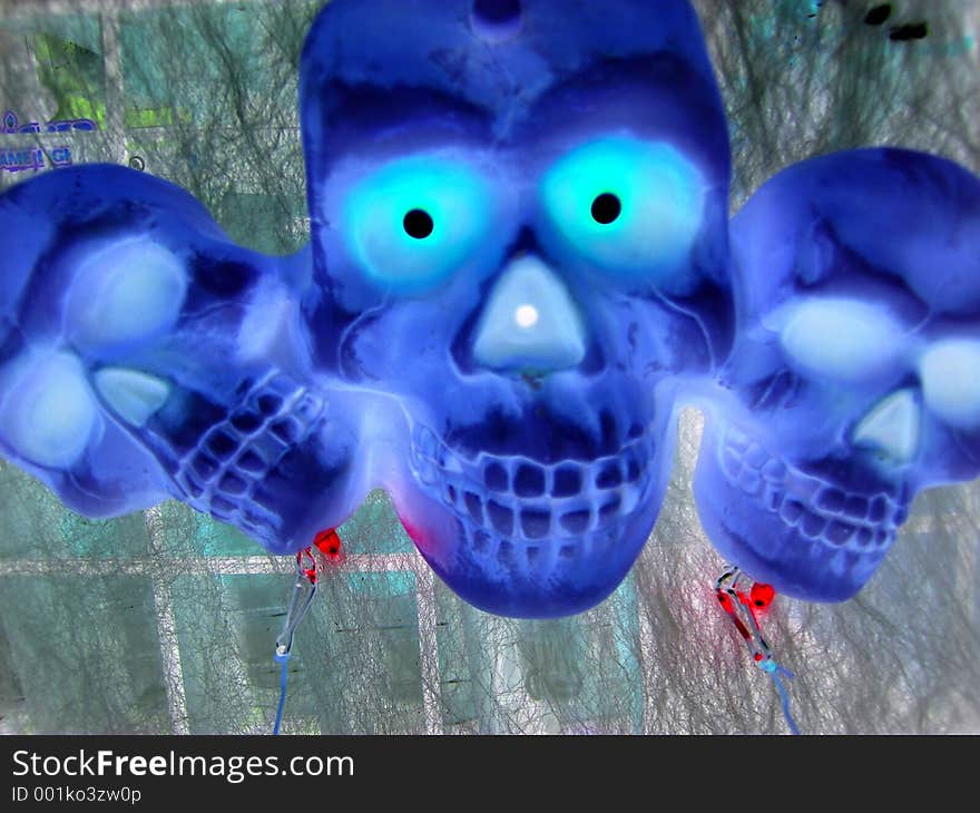 Negative of skulls with lighted eyes. Negative of skulls with lighted eyes