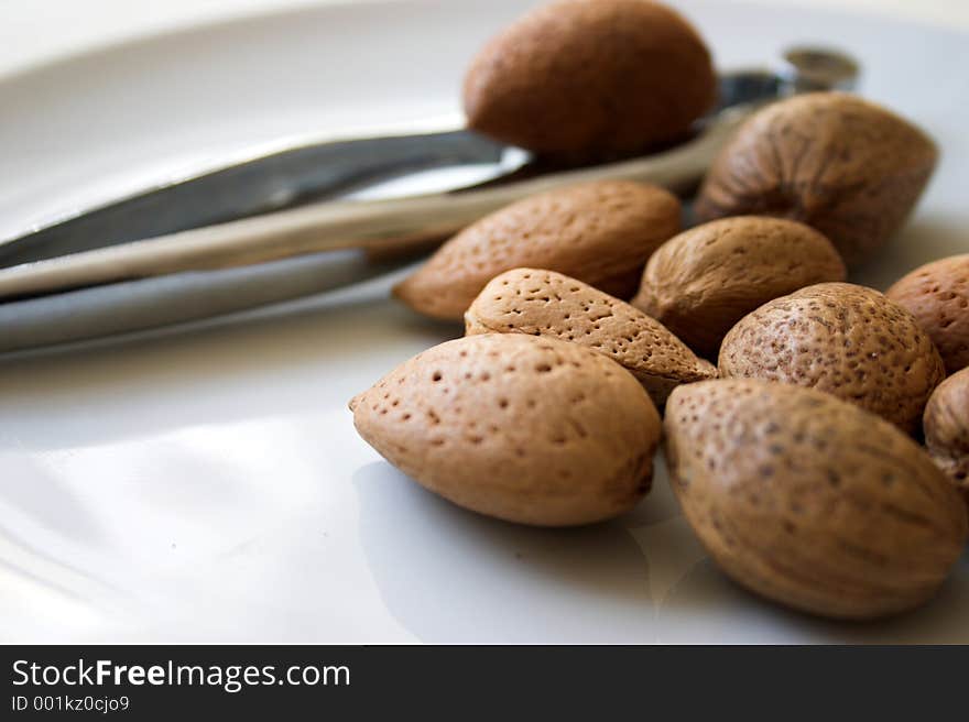 Close up of nuts & nutcracker. Close up of nuts & nutcracker