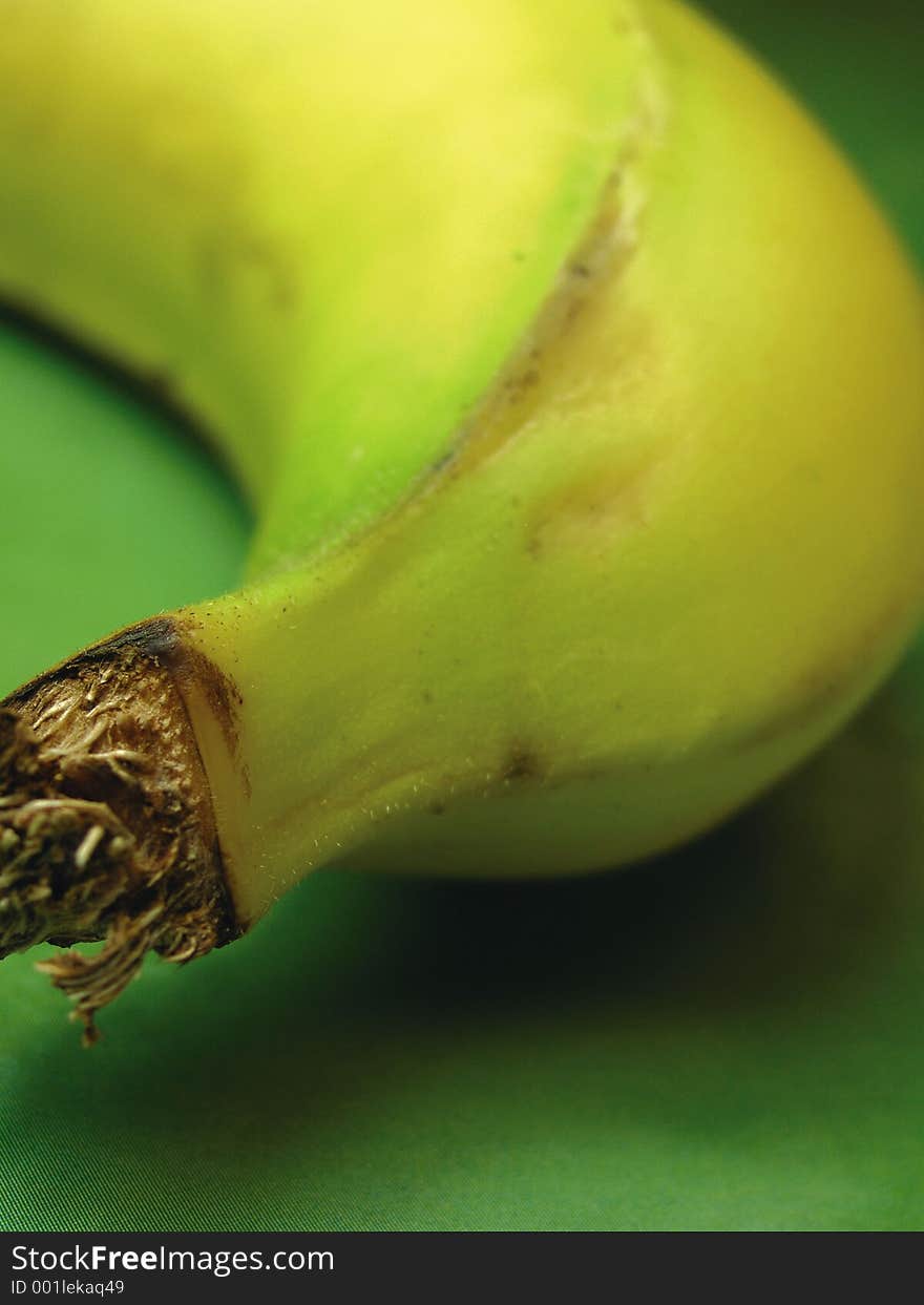 Studio close-up of banana on green background. Studio close-up of banana on green background