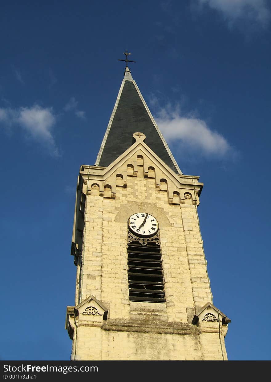 Top of a christian church against blue sky. Top of a christian church against blue sky