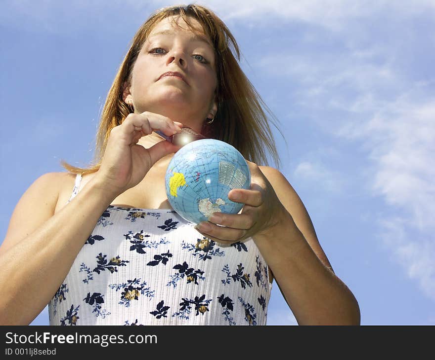 Woman shutting out the world with a remote. Woman shutting out the world with a remote