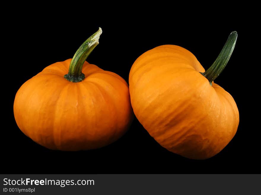 Orange squash isolated on a black background. With clipping path. Orange squash isolated on a black background. With clipping path.