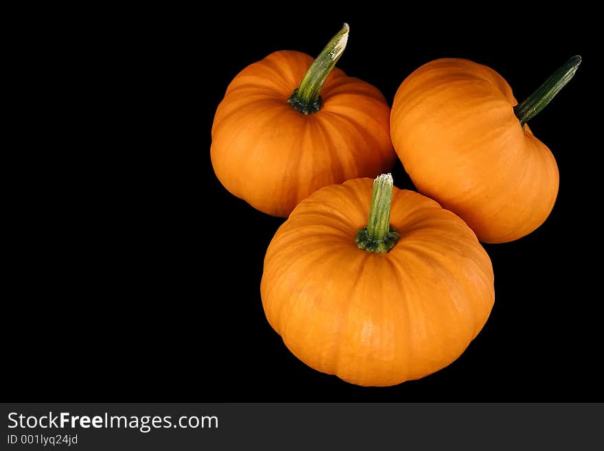 Orange squash isolated on a black background. With clipping path. Orange squash isolated on a black background. With clipping path.