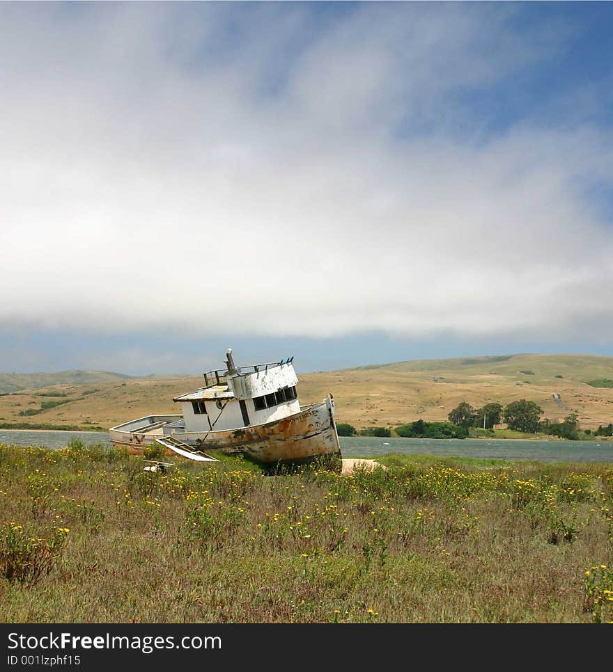 Abandoned fishing boat weathered with time. Abandoned fishing boat weathered with time