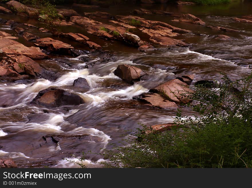 Water flowing over rocks. Water flowing over rocks