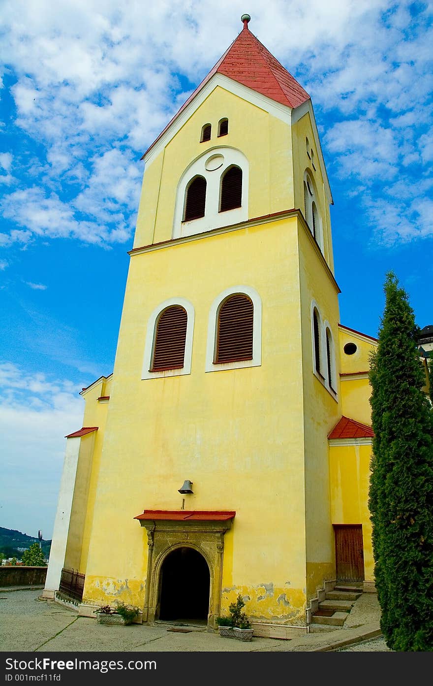 Yellow church and blue sky. Yellow church and blue sky