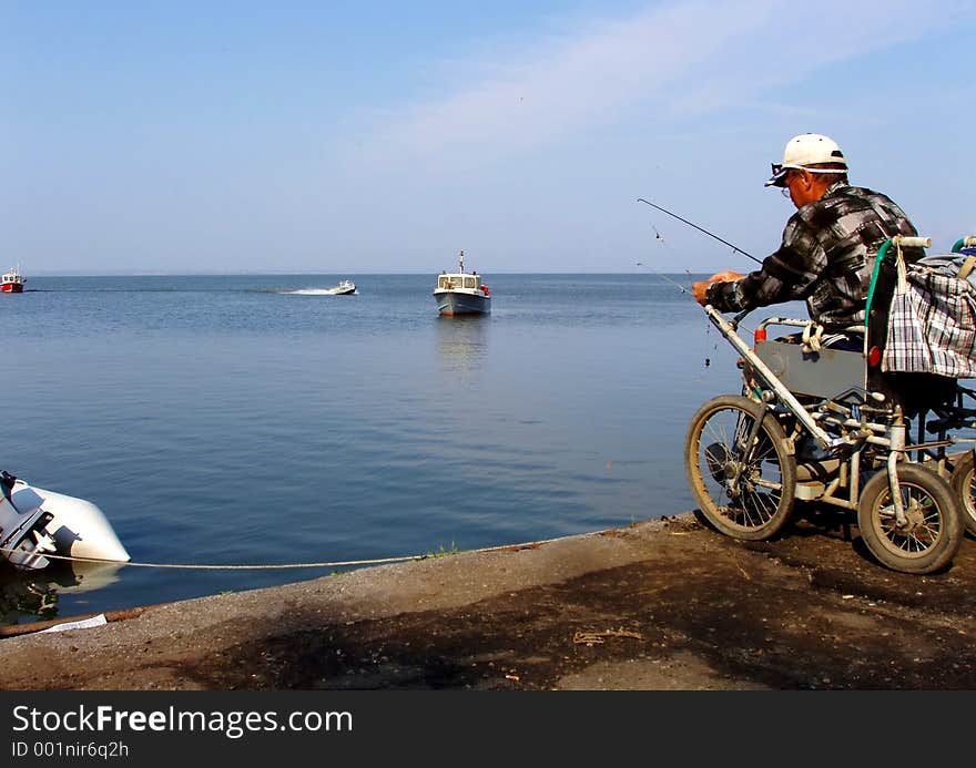 The fisherman on a coast