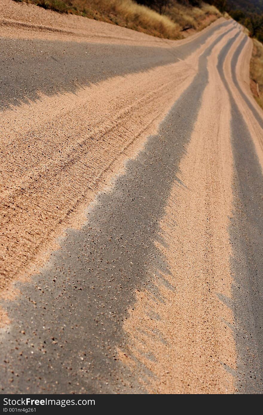 Road with sand on it