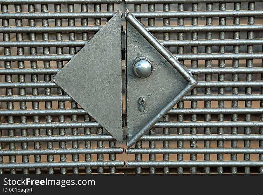 Iron gate closeup with lock and handle. Iron gate closeup with lock and handle