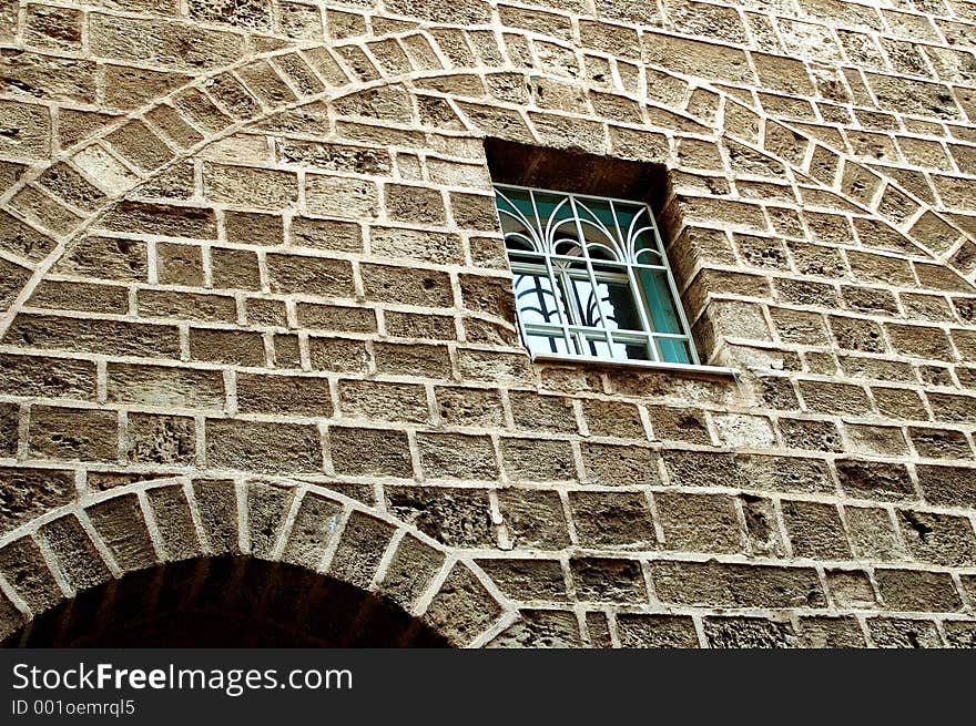 Bluish window in an old wall. Bluish window in an old wall