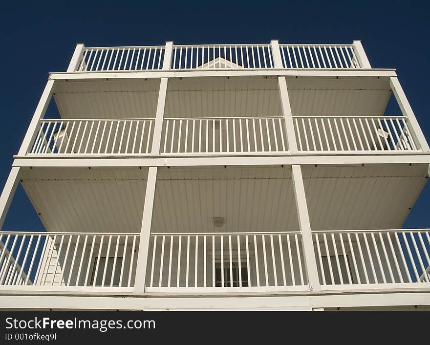 This is a composition of some white balconies on a small hotel in Ocean Grove NJ.